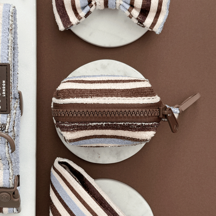 Brown, blue and white striped Poop Bag Holder to hold two rolls of dog poo bags. With zip closure.