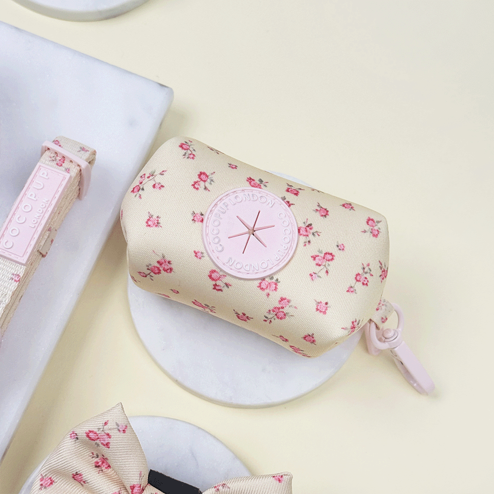 Floral Dog Poop Bag Holder with yellow background and pink flowers.