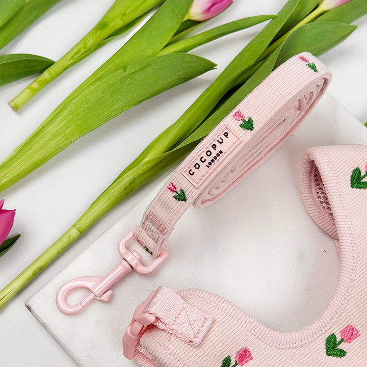 Pink dog lead with tulip embroidery.